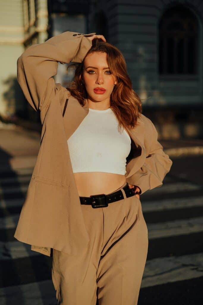 quiet luxury outfit beige tailored suit white crop top golden hour fashion 2026
